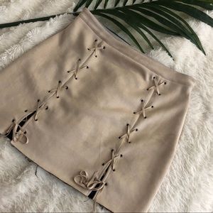 Nude / tan laced up mini skirt